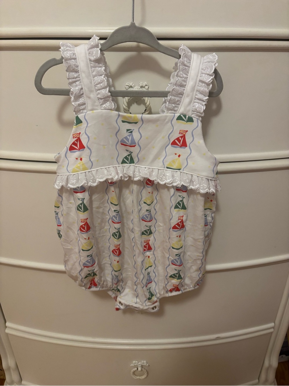 The Beaufort Bonnet Company White Romper with Red, Yellow and Green Boat Print